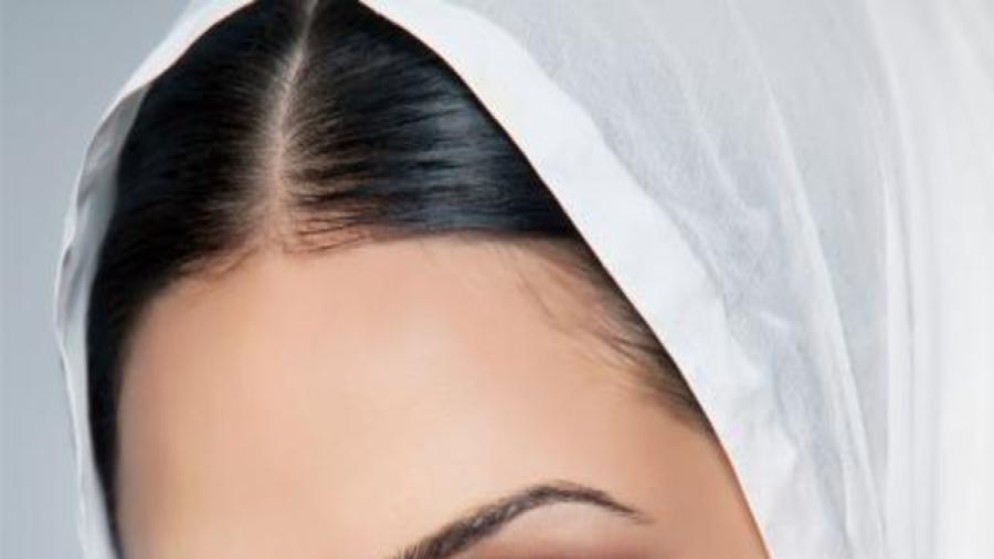 حكم كشف المرأة لجزء من شعرها