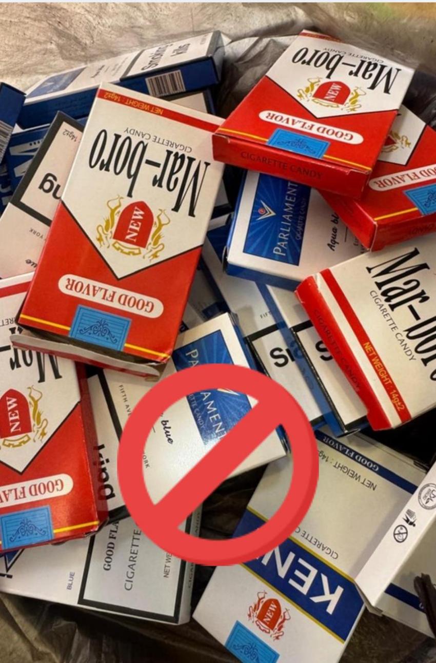 إغلاق سوبر ماركت لضبطه يبيع حلوى على شكل سجائر