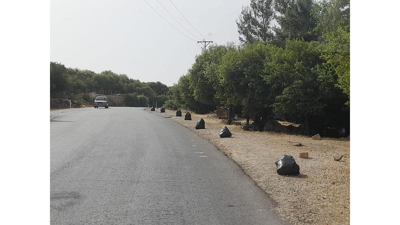 عجلون: مجلس الخدمات المشتركة يجمع 800 كيس نفايات من غابات اشتفينا