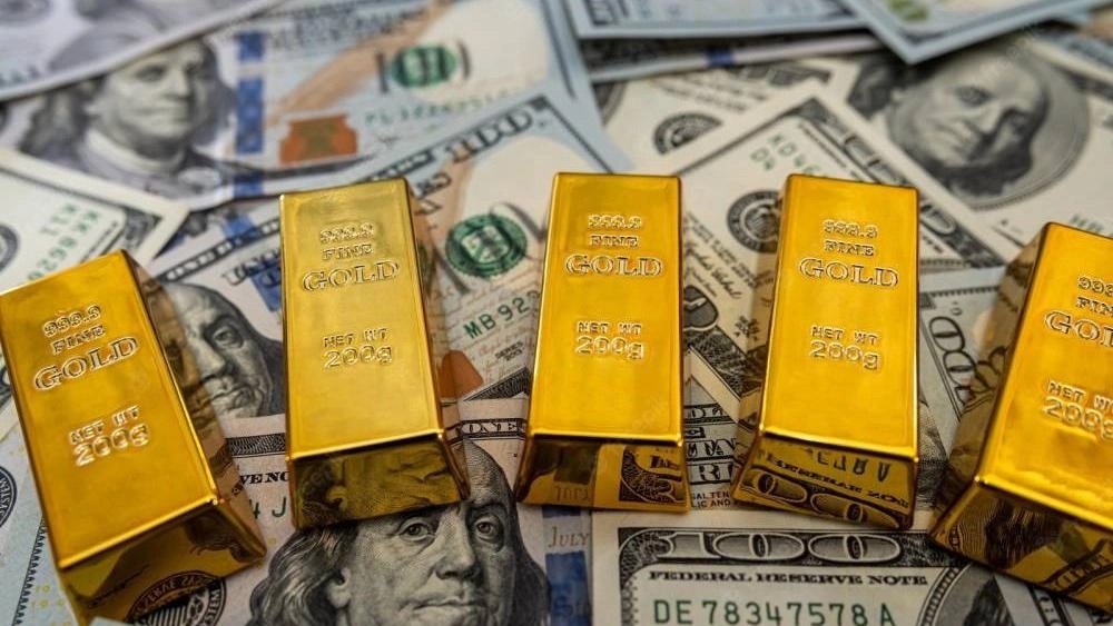 استقرار الذهب وانخفاض الدولار عالميا